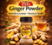 Ginger powder in glass spice jar with fresh ginger roots on wooden kitchen table